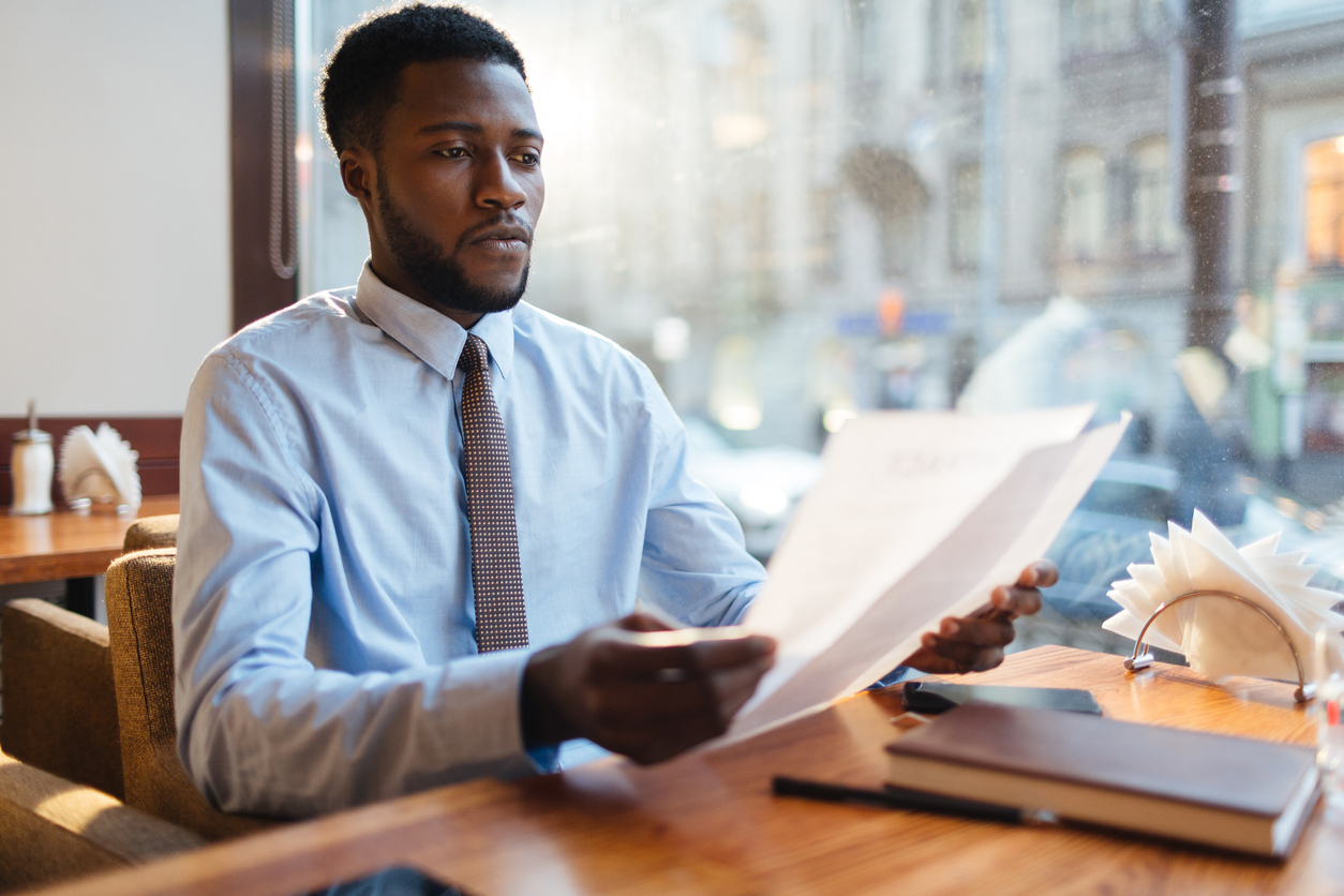 Immigration case manager reading documents